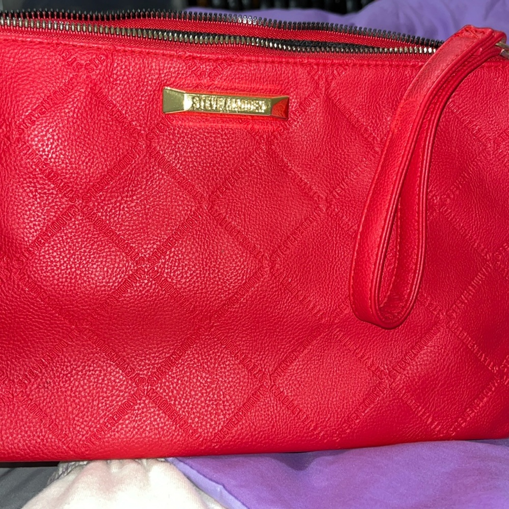 Red Steve Madden makeup bag